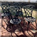 L04. Black outdoor dining chairs.